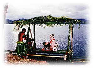 Bride arriving on Traditional Fijian Boat
